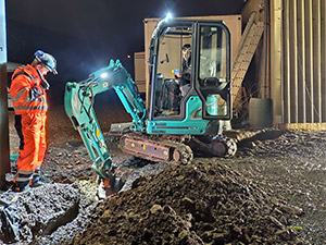 SK17 Mini Digger carrying out trenching and drainage for a new groundworks contract